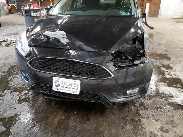 Photo 9 from auction – 2015 FORD FOCUS SE with VIN 1FADP3F26FL235197