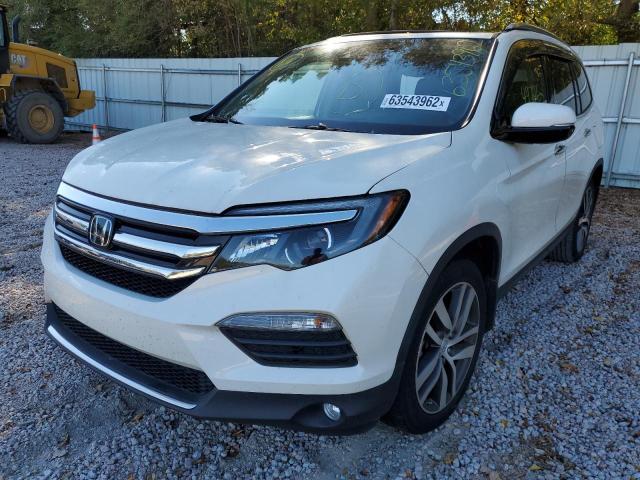 Photo 2 from auction – 2017 HONDA PILOT TOUR with VIN 5FNYF5H92HB033368