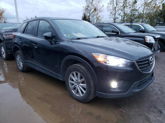 MAZDA CX-5 TOURI 2016 with VIN JM3KE4CY9G0882967 - Photo from auction