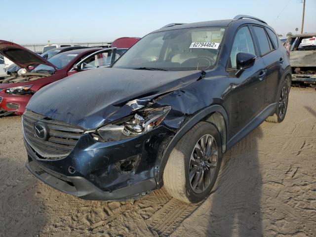 Photo 2 from auction – 2016 MAZDA CX-5 GT with VIN JM3KE4DY9G0825697