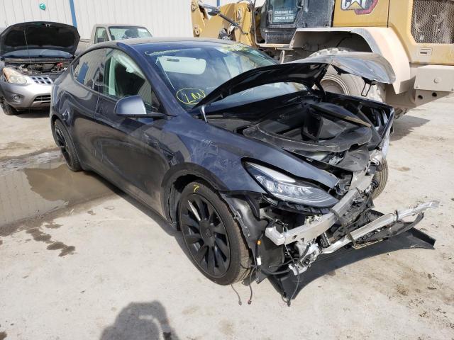 TESLA MODEL Y 2021 with VIN 5YJYGAEE7MF143088 - Photo from auction