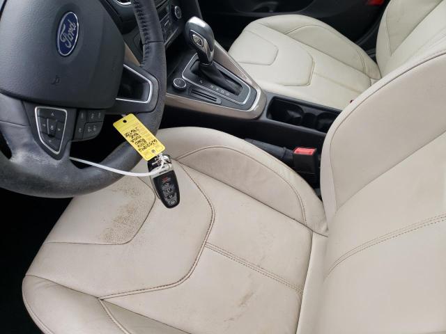 Photo 6 from auction – 2016 FORD FOCUS TITA with VIN 1FADP3J22GL376938