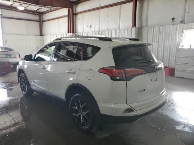 Photo 3 from auction – 2017 TOYOTA RAV4 SE with VIN JTMJFREV7HJ135784