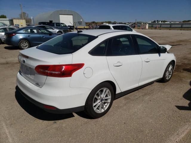 Photo 4 from auction – 2015 FORD FOCUS SE with VIN 1FADP3F23FL270019