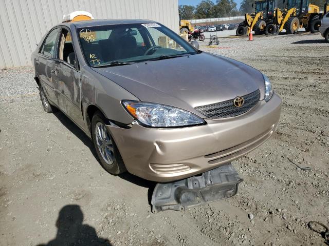 TOYOTA CAMRY LE 2004 with VIN 4T1BF32K94U079928 - Photo from auction