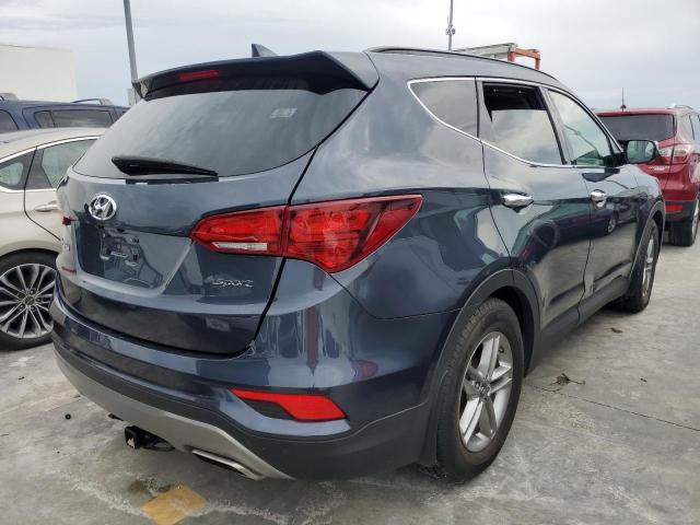 Photo 4 from auction – 2018 HYUNDAI SANTA FE S with VIN 5NMZU3LB0JH065846