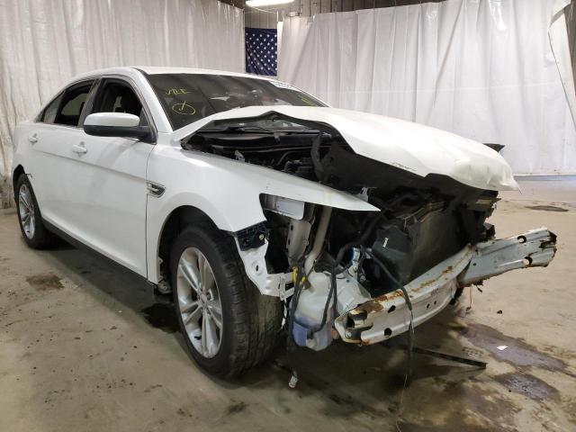 FORD TAURUS 2014 with VIN 1FAHP2E85EG121054 - Photo from auction