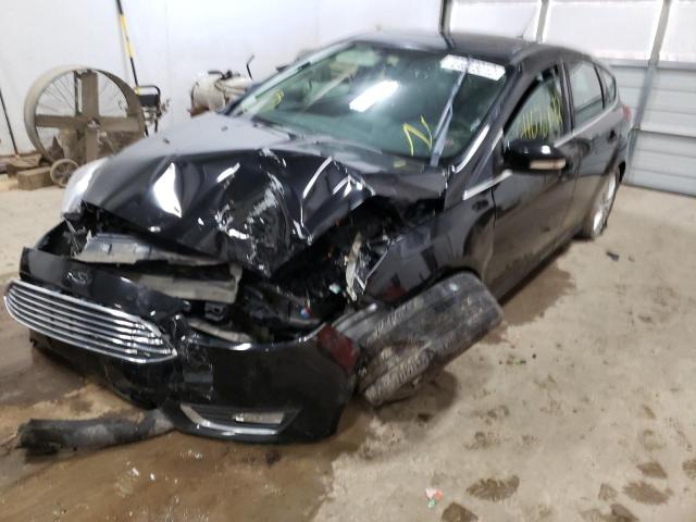 Photo 2 from auction – 2016 FORD FOCUS TITA with VIN 1FADP3N26GL252472