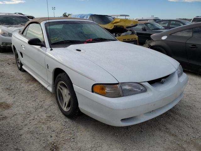 FORD MUSTANG 1998 with VIN 1FAFP4449WF124581 - Photo from auction