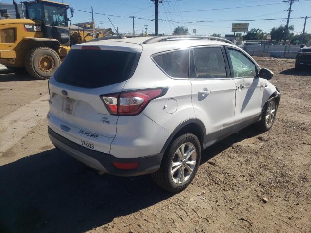 Photo 4 from auction – 2018 FORD ESCAPE SE with VIN 1FMCU9GD9JUA74540