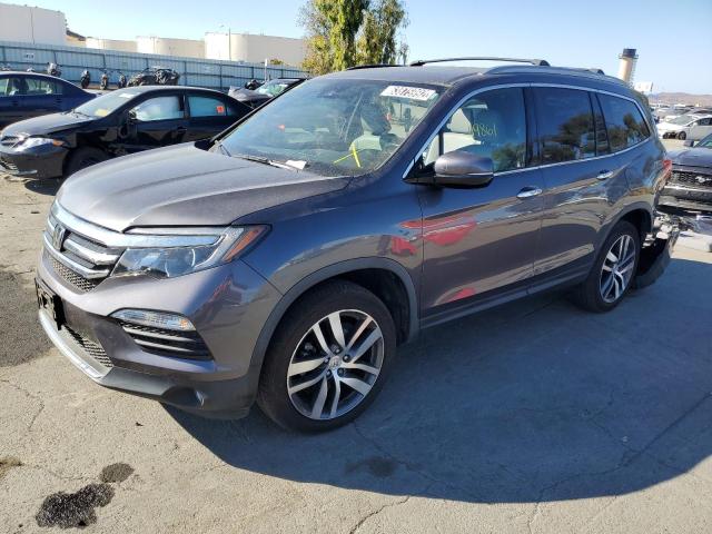 Photo 2 from auction – 2016 HONDA PILOT TOUR with VIN 5FNYF6H95GB059564