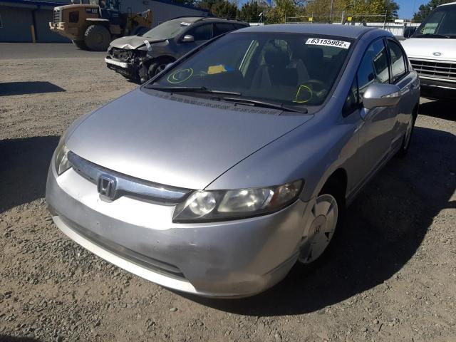 Photo 2 from auction – 2006 HONDA CIVIC HYBR with VIN JHMFA36206S030953