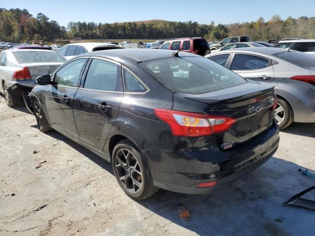 Foto 3 de la subasta – 2014 FORD FOCUS SE con VIN 1FADP3F23EL240596