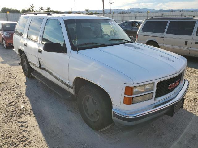 GMC YUKON 1999 with VIN 1GKEC13R7XJ794680 - Photo from auction