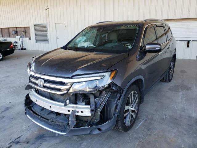 Photo 2 from auction – 2018 HONDA PILOT TOUR with VIN 5FNYF5H9XJB009261