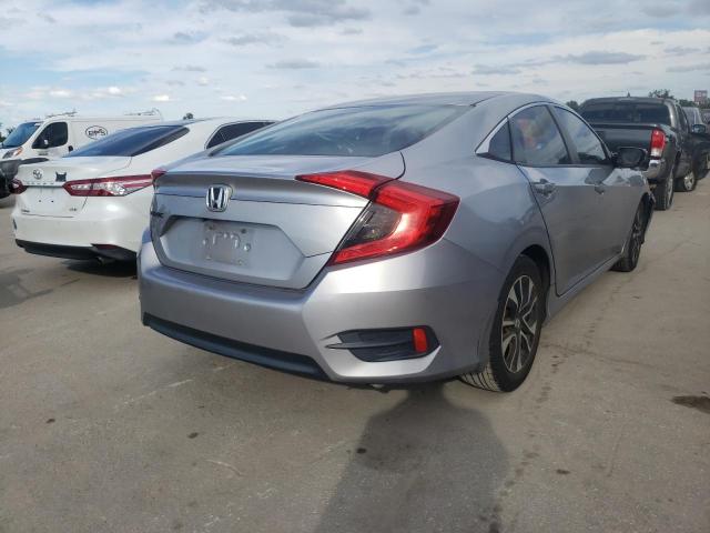 Photo 4 from auction – 2016 HONDA CIVIC LX with VIN 19XFC2F53GE036136