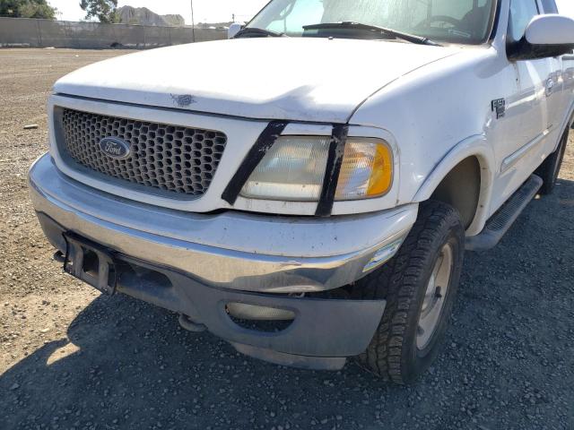 Photo 9 from auction – 2000 FORD F150 with VIN 1FTRX18L5YKA94335