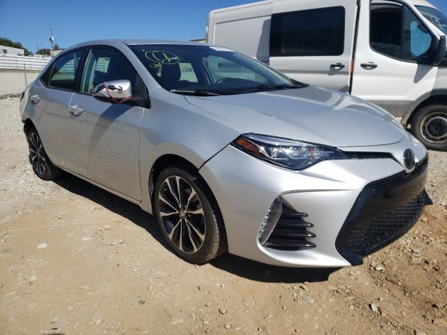 TOYOTA COROLLA L 2017 with VIN 2T1BURHE9HC809984 - Photo from auction