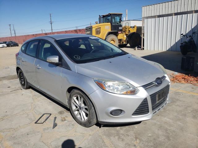 FORD FOCUS SE 2014 with VIN 1FADP3K23EL119136 - Photo from auction