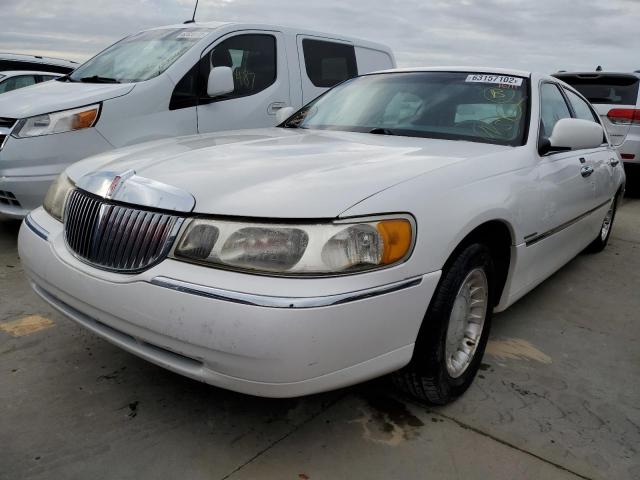 Photo 2 from auction – 2000 LINCOLN TOWN CAR E with VIN 1LNHM81W6YY884382
