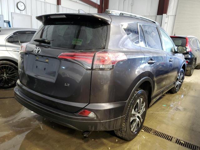 Photo 4 from auction – 2018 TOYOTA RAV4 LE with VIN JTMZFREV5JJ185463