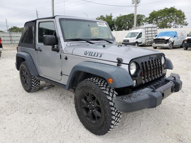 JEEP WRANGLER S 2015 with VIN 1C4AJWAG2FL554955 - Photo from auction