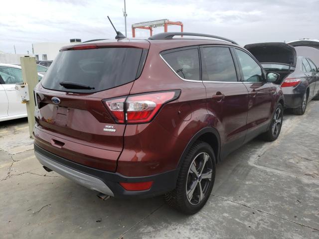 Photo 4 from auction – 2018 FORD ESCAPE SEL with VIN 1FMCU0HD4JUA52102