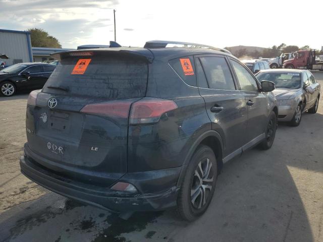 Photo 4 from auction – 2017 TOYOTA RAV4 LE with VIN JTMZFREV8HJ715581