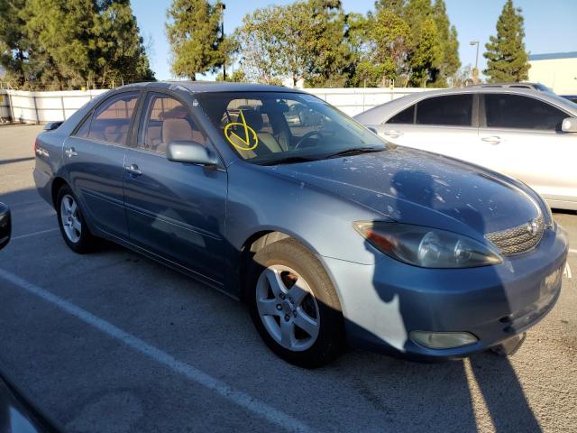 TOYOTA CAMRY LE 2003 with VIN 4T1BF32K33U555220 - Photo from auction