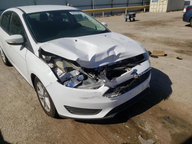Photo 9 from auction – 2015 FORD FOCUS SE with VIN 1FADP3F23FL270019