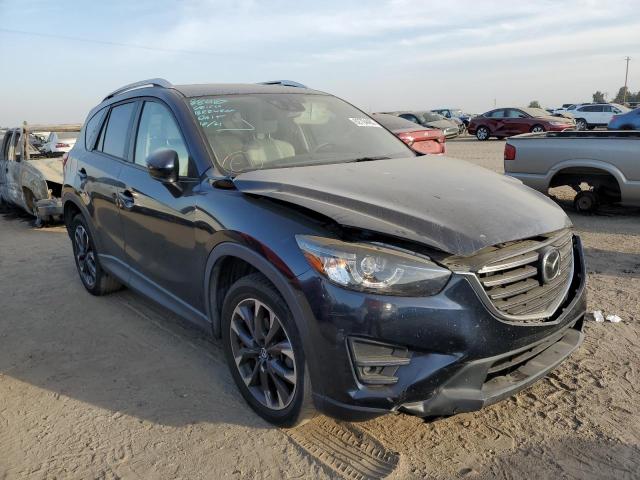 MAZDA CX-5 GT 2016 with VIN JM3KE4DY9G0825697 - Photo from auction