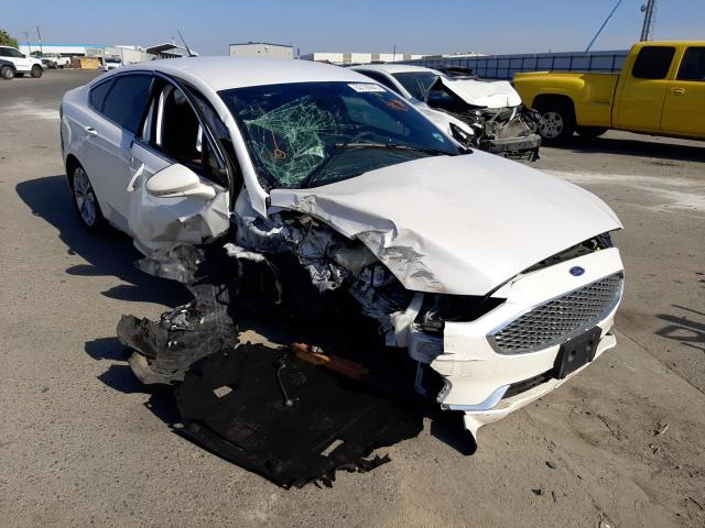 FORD FUSION TIT 2020 with VIN 3FA6P0SUXLR127595 - Photo from auction