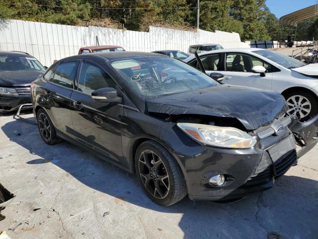 FORD FOCUS SE 2014 with VIN 1FADP3F23EL240596 - Photo from auction