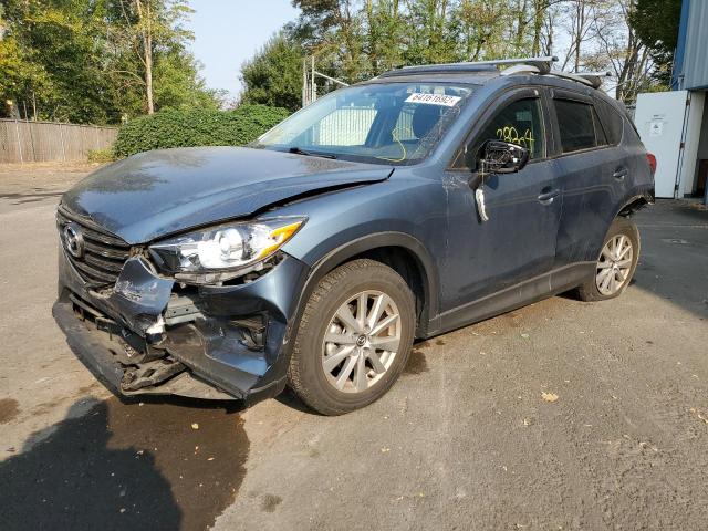 Photo 2 from auction – 2016 MAZDA CX-5 TOURI with VIN JM3KE4CY1G0909241