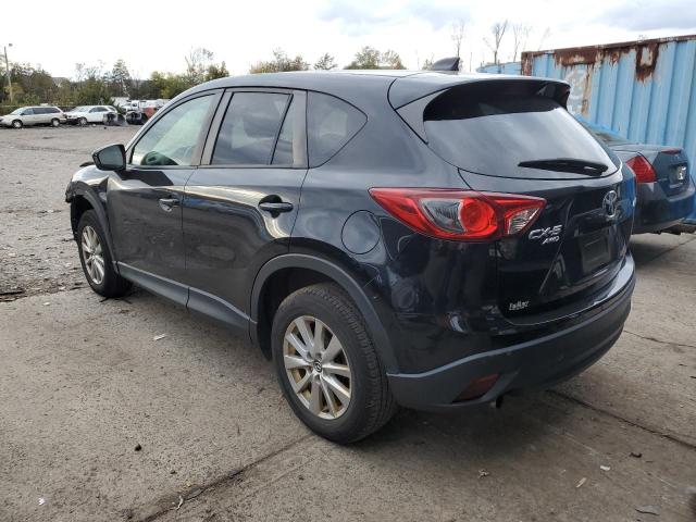 Photo 3 from auction – 2014 MAZDA CX-5 TOURI with VIN JM3KE4CY9E0415061