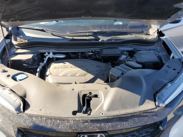 Photo 7 from auction – 2021 HONDA PASSPORT E with VIN 5FNYF7H50MB008990