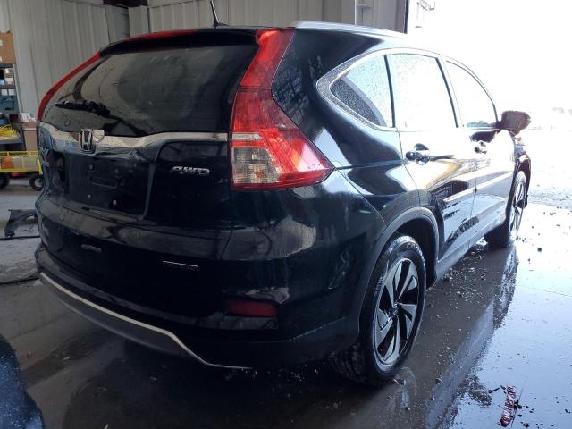 Photo 4 from auction – 2015 HONDA CR-V TOURI with VIN 5J6RM4H96FL095784