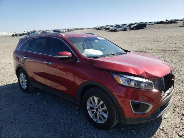 KIA SORENTO LX 2016 with VIN 5XYPG4A30GG165965 - Photo from auction