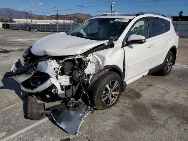 Photo 2 from auction – 2018 TOYOTA RAV4 ADVEN with VIN JTMRFREVXJD238494