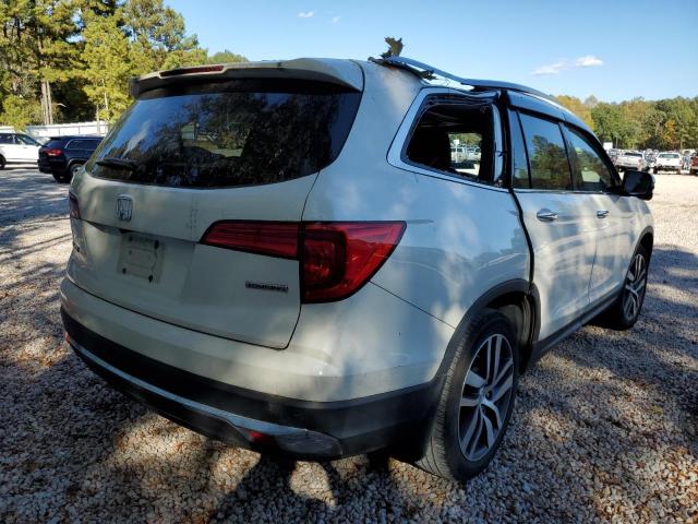 Photo 4 from auction – 2017 HONDA PILOT TOUR with VIN 5FNYF5H92HB033368
