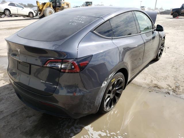 Photo 4 from auction – 2021 TESLA MODEL Y with VIN 5YJYGAEE7MF143088