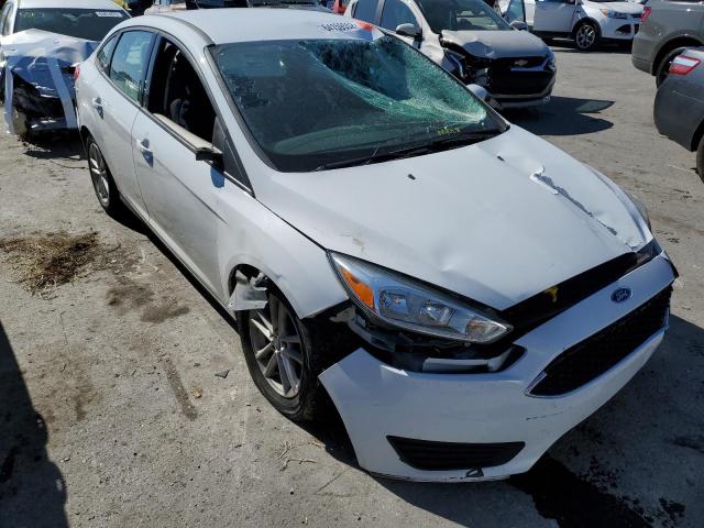 FORD FOCUS SE 2017 with VIN 1FADP3F2XHL240972 - Photo from auction