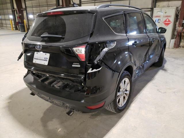 Photo 4 from auction – 2018 FORD ESCAPE SEL with VIN 1FMCU0HD7JUB21509