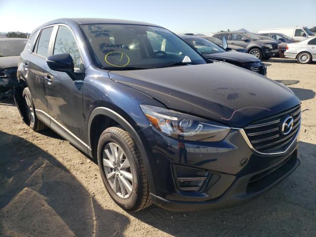 MAZDA CX-5 TOURI 2016 with VIN JM3KE2CY6G0657734 - Photo from auction