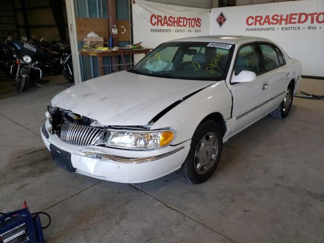 Photo 2 from auction – 2002 LINCOLN CONTINENTA with VIN 1LNHM97VX2Y621937