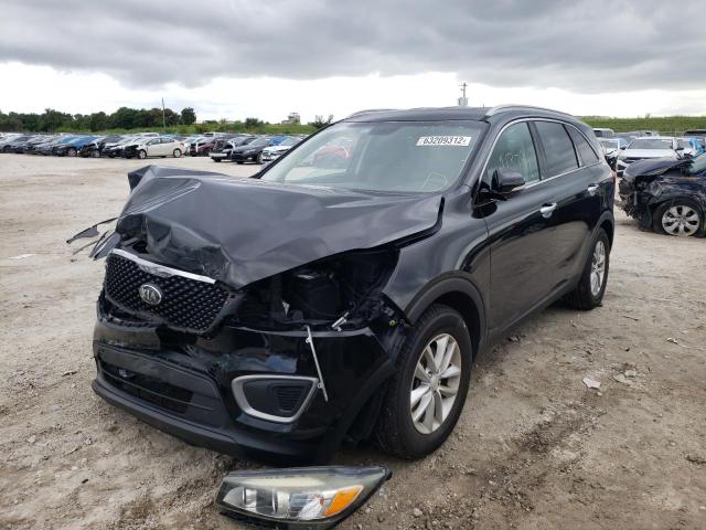 Photo 2 from auction – 2016 KIA SORENTO LX with VIN 5XYPG4A33GG009869