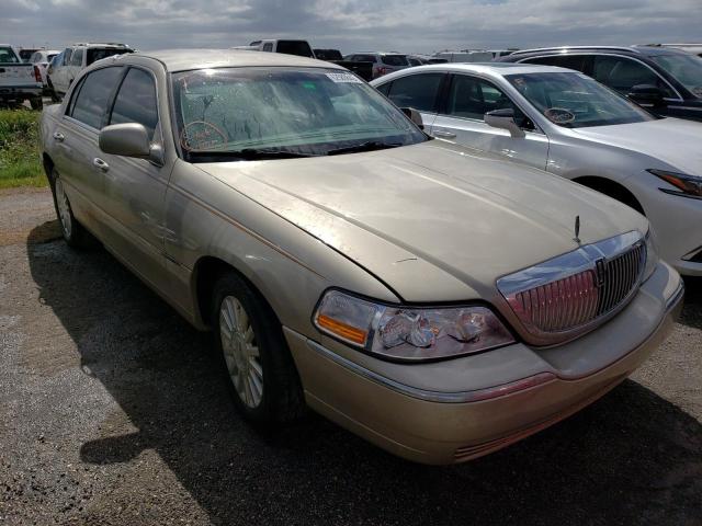 LINCOLN TOWN CAR U 2004 with VIN 1LNHM83WX4Y672365 - Photo from auction
