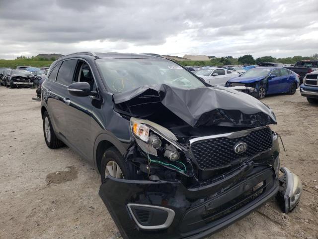 KIA SORENTO LX 2016 with VIN 5XYPG4A33GG009869 - Photo from auction