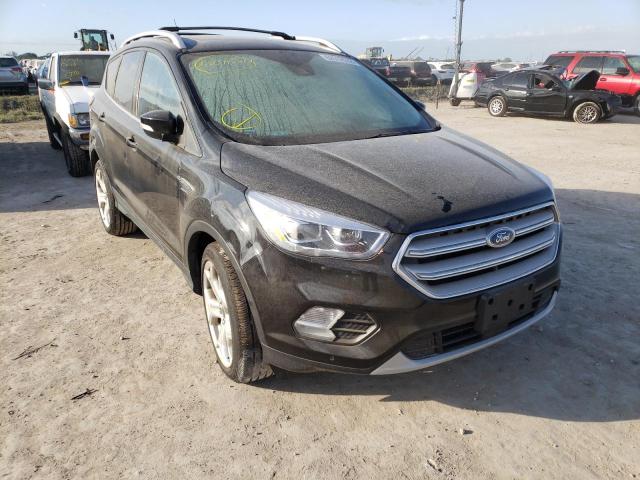 FORD ESCAPE TIT 2018 with VIN 1FMCU9J96JUD44182 - Photo from auction