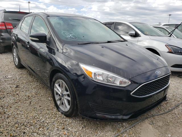 FORD FOCUS SE 2018 with VIN 1FADP3F21JL260436 - Photo from auction
